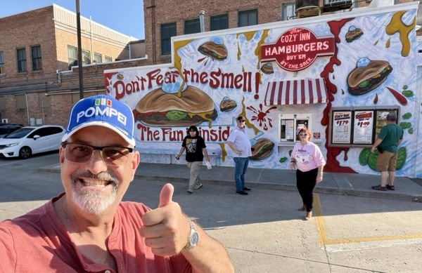 A smile outside the Cozy Inn — photo 22