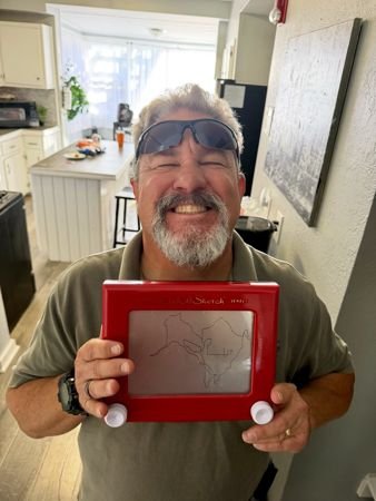 Holding a framed keepsake — photo 25